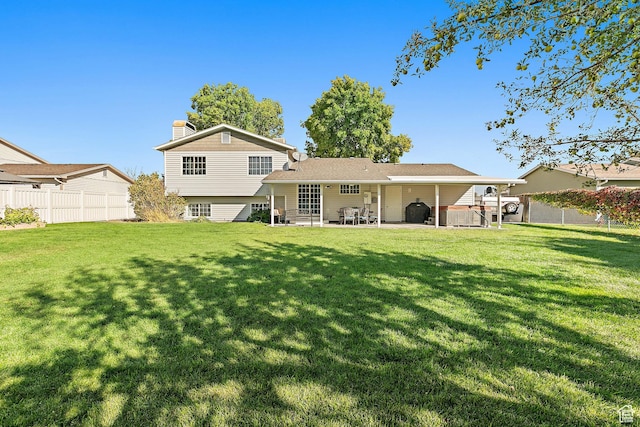 2119 W 12190 S, Riverton, UT 84065 - rear view of house featuring a patio area and a chimney