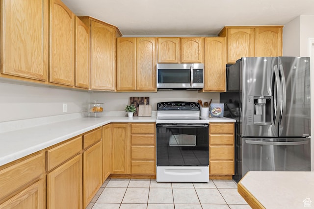 2119 W 12190 S, Riverton, UT 84065 - kitchen featuring stainless steel appliances, light tile patterned flooring, light countertops, and light brown cabinetry