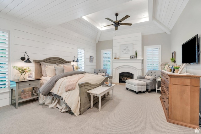 575 S 1560 E, Mapleton, UT 84664 - bedroom featuring vaulted ceiling, carpet, a fireplace, wooden walls, and a ceiling fan