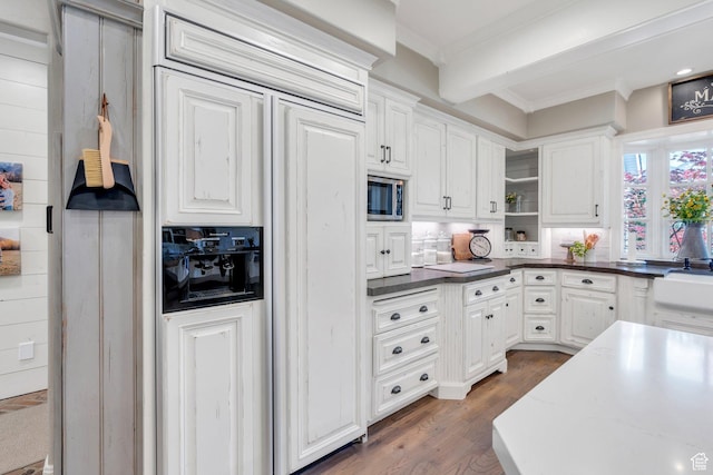 575 S 1560 E, Mapleton, UT 84664 - kitchen with stainless steel microwave, paneled built in fridge, open shelves, white cabinets, and ornamental molding