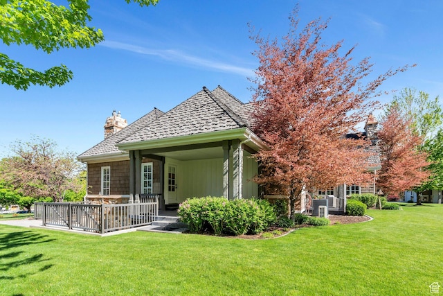 575 S 1560 E, Mapleton, UT 84664 - back of property with a yard, a chimney, cooling unit, and a wooden deck