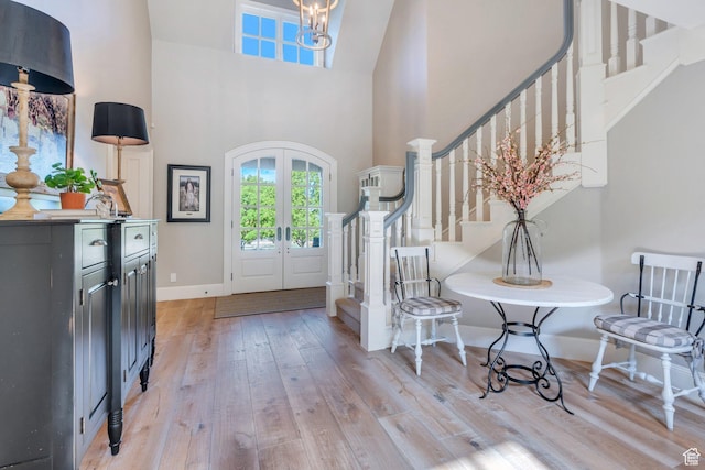 575 S 1560 E, Mapleton, UT 84664 - entryway featuring stairs, french doors, light wood-type flooring, a high ceiling, and baseboards