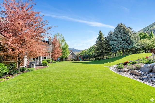 575 S 1560 E, Mapleton, UT 84664 - view of green lawn with a playground and a mountain view