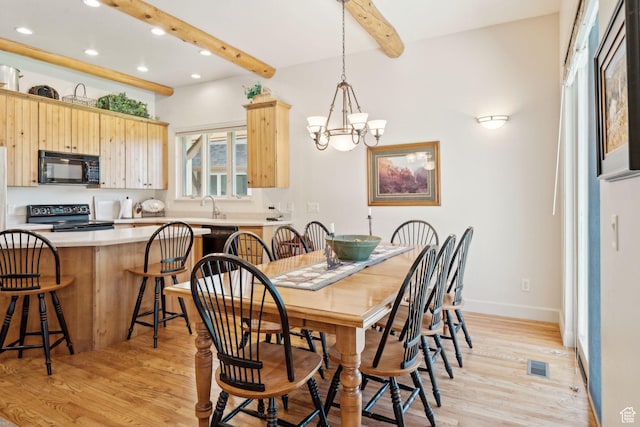 dining room with recessed lighting, light wood-style flooring, beamed ceiling, a chandelier, and baseboards