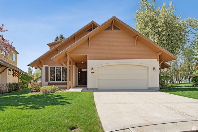 view of front of property featuring an attached garage, a front lawn, and driveway