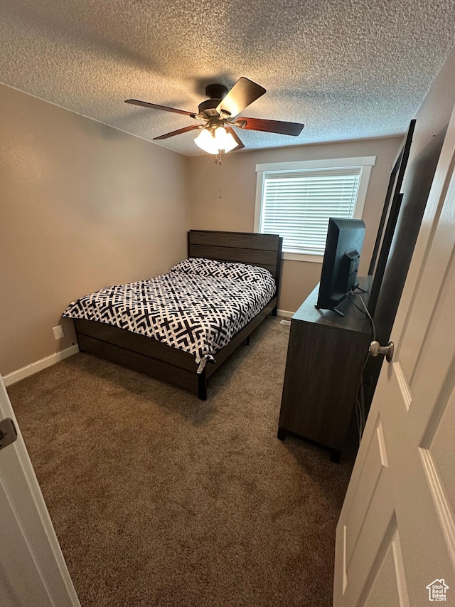 250 W 100 S, Duchesne, UT 84021 - bedroom with a textured ceiling, carpet flooring, ceiling fan, and baseboards
