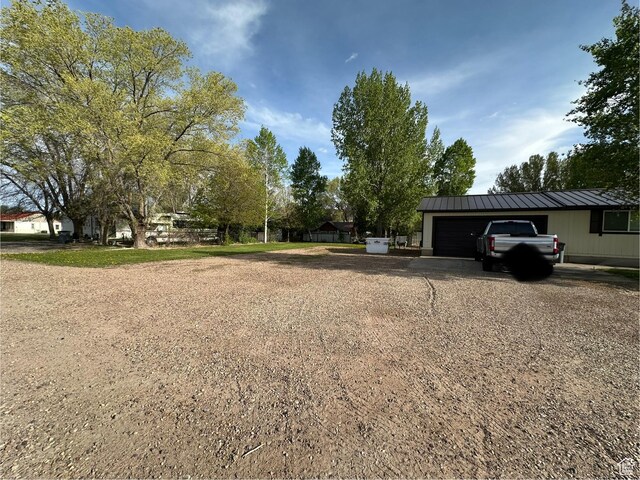 250 W 100 S, Duchesne, UT 84021 - view of yard with an attached garage and driveway