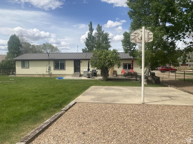 250 W 100 S, Duchesne, UT 84021 - rear view of property with metal roof, entry steps, and a standing seam roof