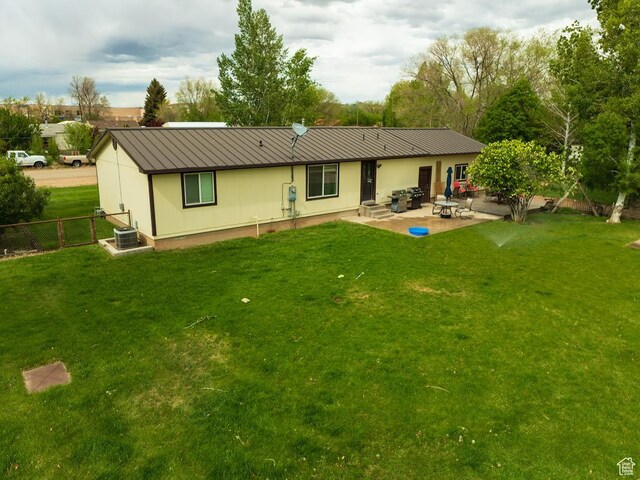 250 W 100 S, Duchesne, UT 84021 - back of house with a patio, metal roof, and a standing seam roof