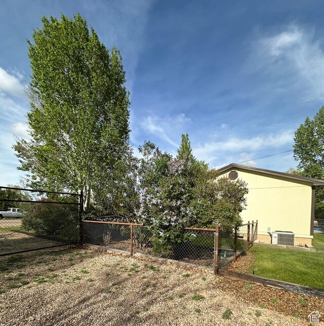 250 W 100 S, Duchesne, UT 84021 - view of yard featuring fence and cooling unit