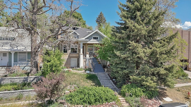 view of front of property with stairs