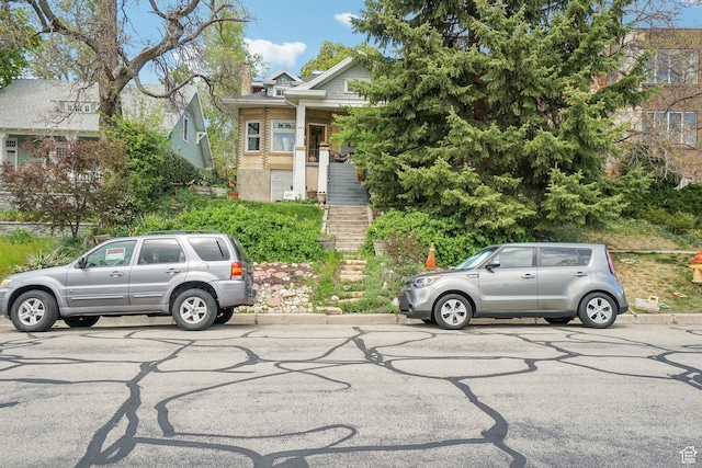 obstructed view of property with stairway