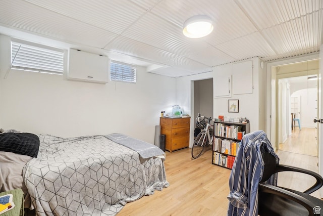 bedroom featuring light wood finished floors