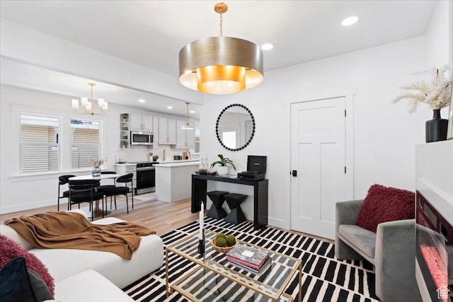 328 E Hampton Ave S, Salt Lake City, UT 84111 - living area with a chandelier, light wood finished floors, and recessed lighting