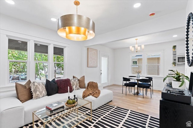328 E Hampton Ave S, Salt Lake City, UT 84111 - living area featuring healthy amount of natural light, a chandelier, light wood finished floors, and recessed lighting