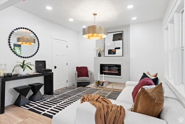 328 E Hampton Ave S, Salt Lake City, UT 84111 - living room with wood finished floors, recessed lighting, and a fireplace