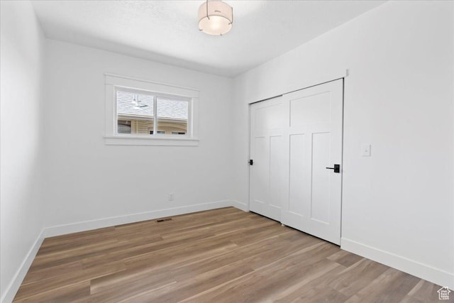 328 E Hampton Ave S, Salt Lake City, UT 84111 - unfurnished bedroom with light wood-style floors and a closet