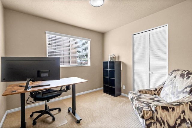home office with carpet and baseboards