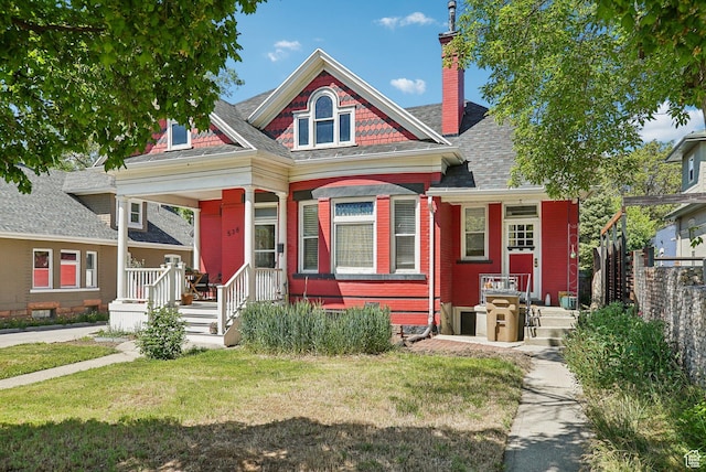 538 S 800 E, Salt Lake City, UT 84102 - victorian home with a porch and a chimney