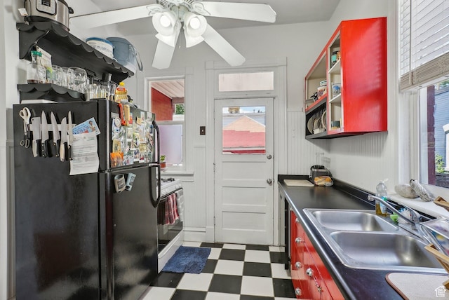 538 S 800 E, Salt Lake City, UT 84102 - kitchen featuring freestanding refrigerator, a sink, tile patterned floors, and plenty of natural light