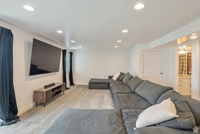7881 S Highlandpoint Way, West Jordan, UT 84081 - living room featuring recessed lighting, baseboards, light carpet, and a textured ceiling