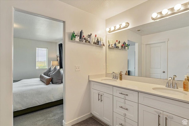 7881 S Highlandpoint Way, West Jordan, UT 84081 - full bathroom with ensuite bath, double vanity, and a textured ceiling