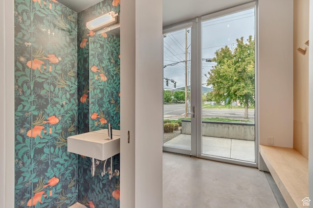 608 S 400 E, Salt Lake City, UT 84111 - doorway featuring finished concrete floors and a sink