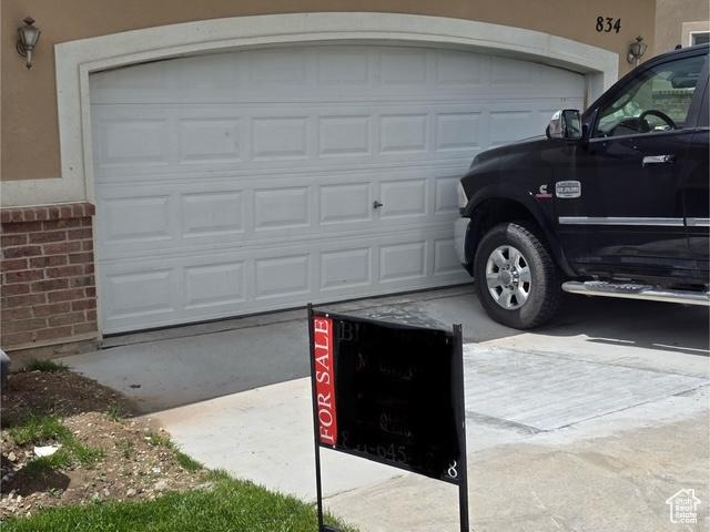 834 N Sapphire St, Morgan, UT 84050 - garage featuring concrete driveway