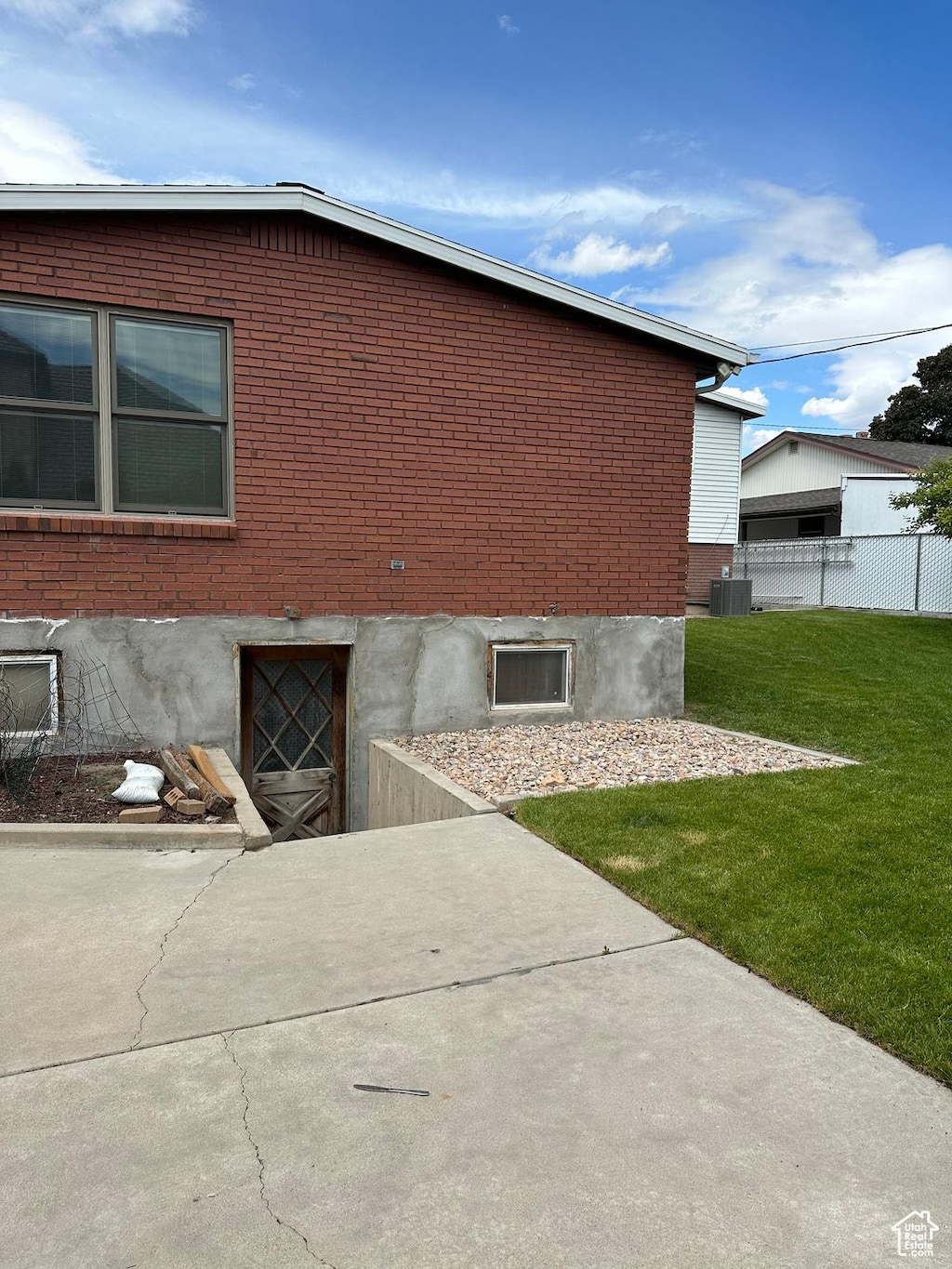 1621 W 950 N, Provo, UT 84604 - view of side of property with brick siding and central air condition unit