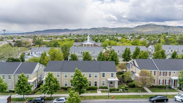 aerial view of residential area with a mountainous background