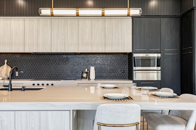 1964 E Upper Lookout Knoll Cir Unit 371, Heber City, UT 84032 - kitchen with a warming drawer, modern cabinets, stainless steel oven, and tasteful backsplash