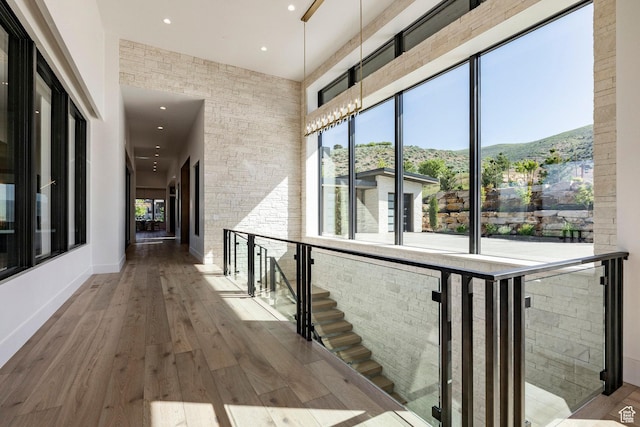 1964 E Upper Lookout Knoll Cir Unit 371, Heber City, UT 84032 - corridor featuring a high ceiling, recessed lighting, wood-type flooring, and a mountain view