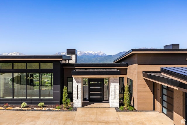 1964 E Upper Lookout Knoll Cir Unit 371, Heber City, UT 84032 - property entrance with a mountain view and stone siding