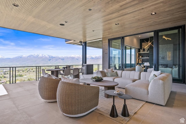 view of patio featuring a mountain view and outdoor lounge area