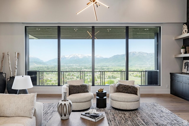 1964 E Upper Lookout Knoll Cir Unit 371, Heber City, UT 84032 - living room featuring plenty of natural light, wood finished floors, and a mountain view
