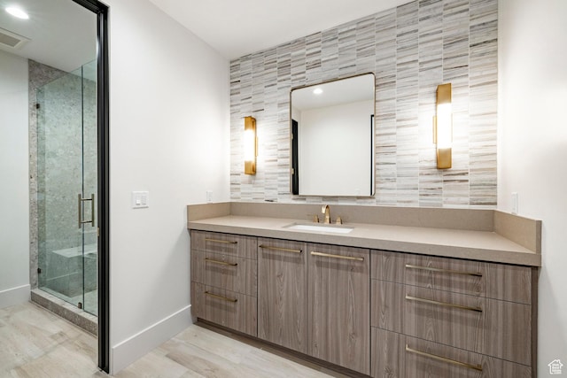 1964 E Upper Lookout Knoll Cir Unit 371, Heber City, UT 84032 - bathroom with vanity, wood finished floors, a stall shower, and tile walls