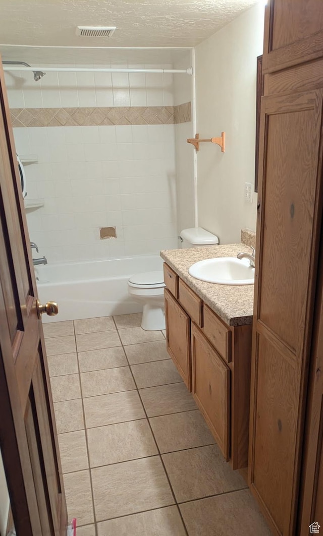 15059 S Rose Creek Ln, Herriman, UT 84096 - bathroom with tile patterned floors, vanity, shower / bath combination, and a textured ceiling