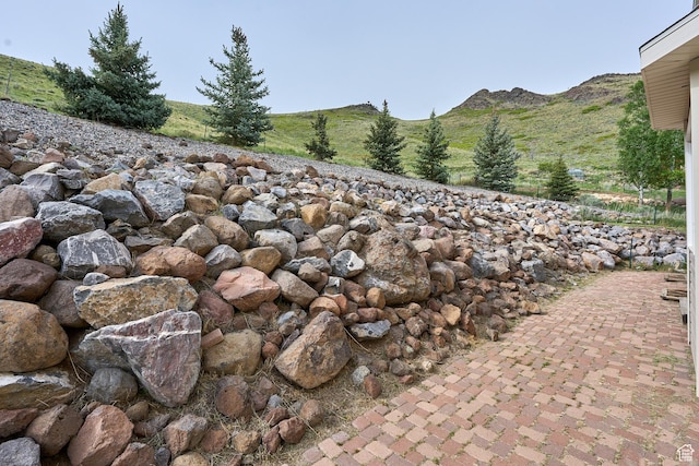 15059 S Rose Creek Ln, Herriman, UT 84096 - exterior view of a mountain backdrop