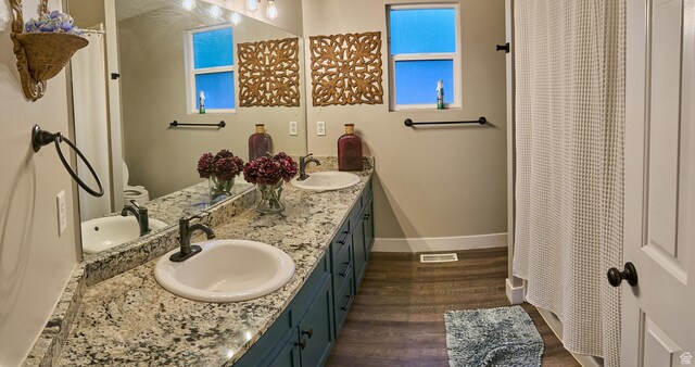 15059 S Rose Creek Ln, Herriman, UT 84096 - bathroom with wood finished floors and double vanity