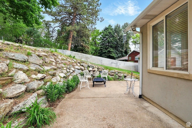 view of patio / terrace with fence