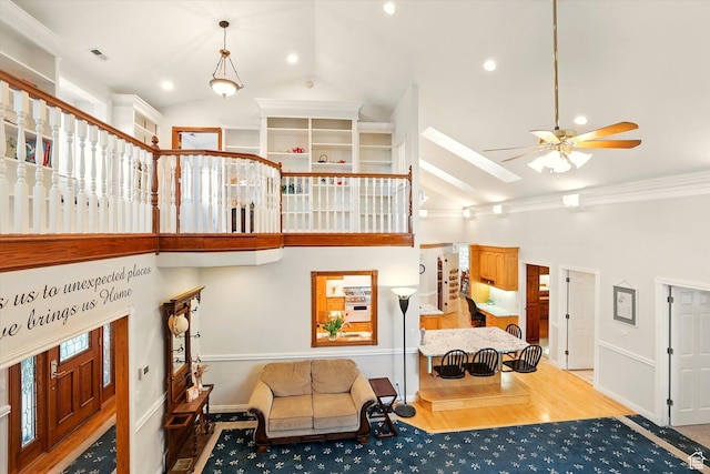 living room with high vaulted ceiling, a ceiling fan, wood finished floors, recessed lighting, and baseboards