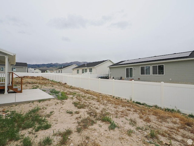 fenced backyard featuring a patio area