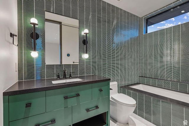 7455 N Promontory Ranch Rd, Park City, UT 84098 - full bath featuring tile walls, toilet, vanity, a tub, and backsplash