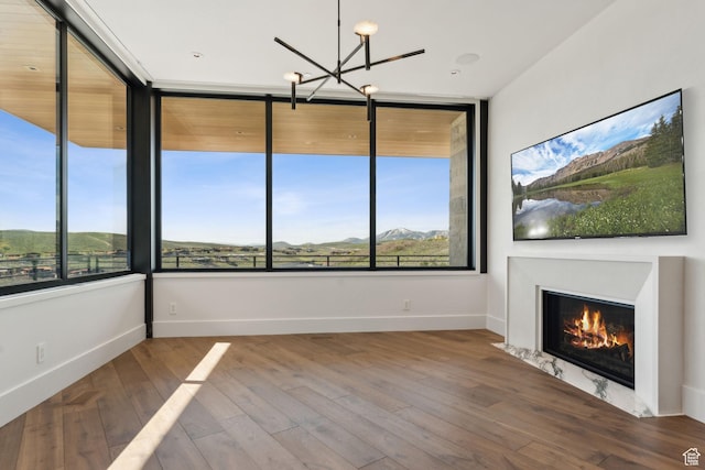 7455 N Promontory Ranch Rd, Park City, UT 84098 - unfurnished sunroom featuring a chandelier