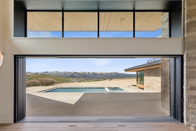 7455 N Promontory Ranch Rd, Park City, UT 84098 - view of swimming pool featuring a mountain view and a pool with connected hot tub