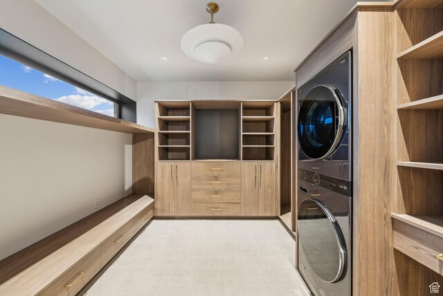 7455 N Promontory Ranch Rd, Park City, UT 84098 - laundry area featuring stacked washer / drying machine and light colored carpet