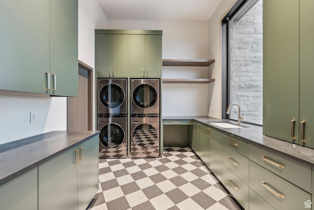 7455 N Promontory Ranch Rd, Park City, UT 84098 - clothes washing area featuring cabinet space, estacked washer and dryer, and light flooring
