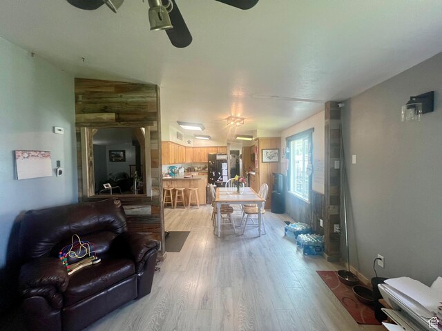 465 E Kings Ln, Green River, UT 84525 - living room with light wood-type flooring and a ceiling fan