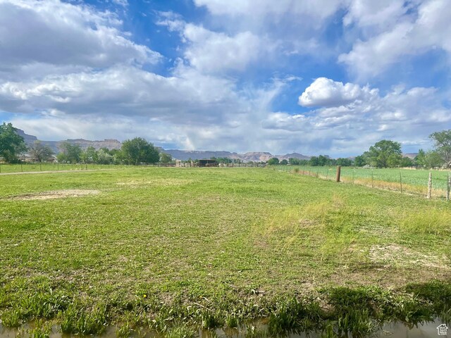 465 E Kings Ln, Green River, UT 84525 - view of yard with a view of countryside and a mountain view