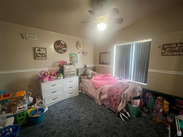 465 E Kings Ln, Green River, UT 84525 - bedroom featuring lofted ceiling, dark carpet, and ceiling fan